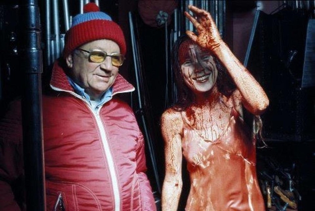 3 Carrie is having a blast while covered in pigs blood