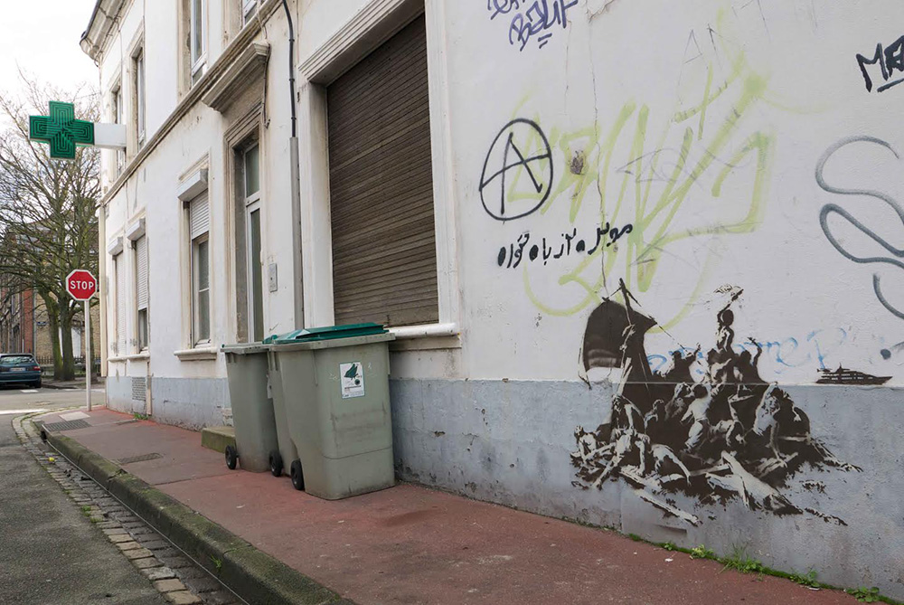 Banksy Syria migrant steve jobs4