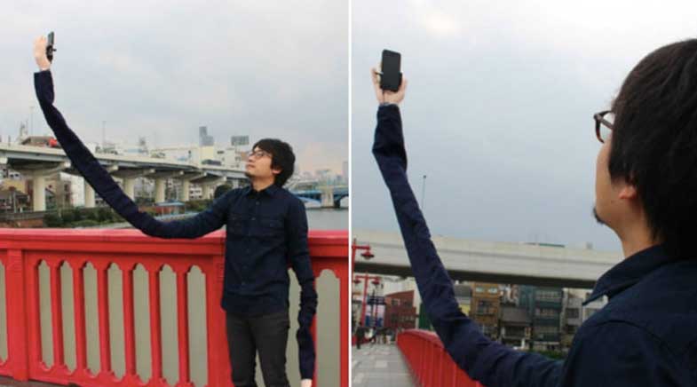 Man makes selfie arms to avoid being seen using selfie sticks