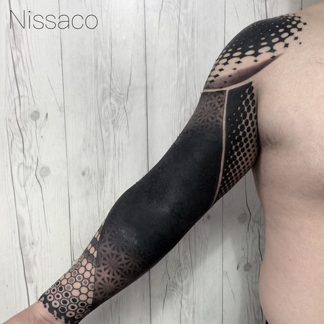 Blackout Tattoo tatuaje negro