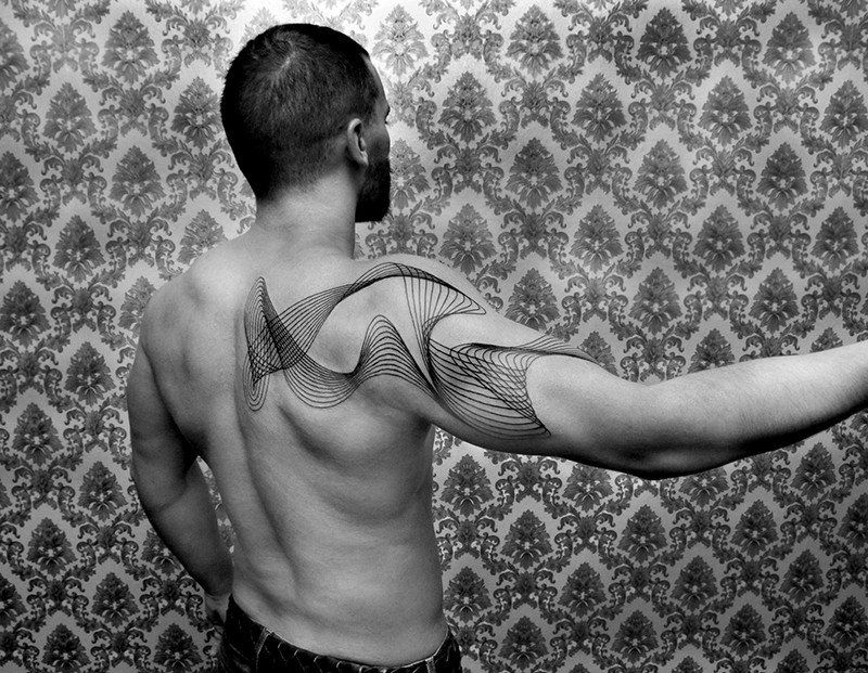 Chaim Machlev tatuajes minimalistas geometricos 9