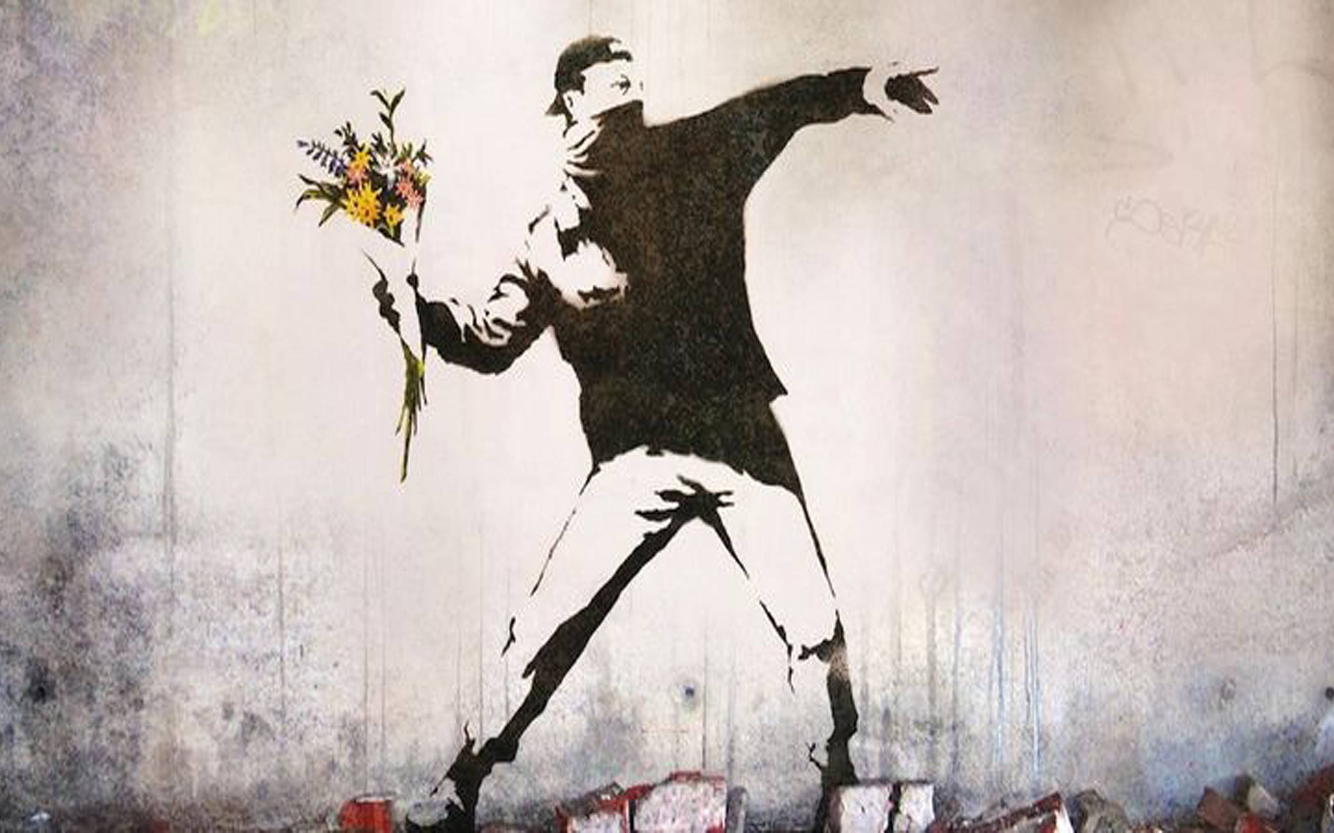 Obra de Banksy, The Flower Thrower.