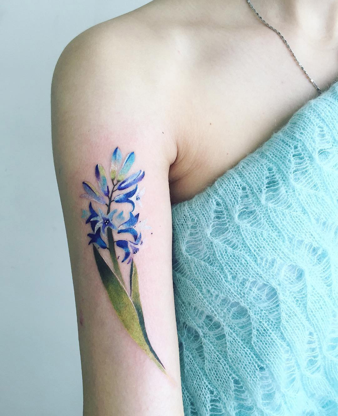 Pis Saro tatuajes florales 7