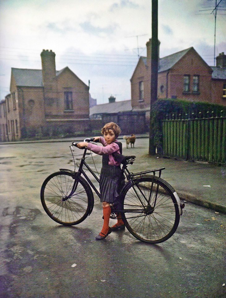 Girl with a bicycle Dublin 1966 By Evelyn Hofer