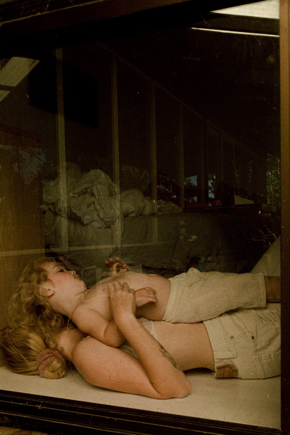 behind glass 1
