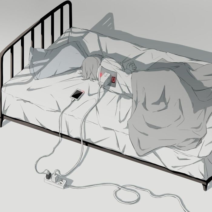una chica yace en la cama cargando su móvil y cargando su cuerpo